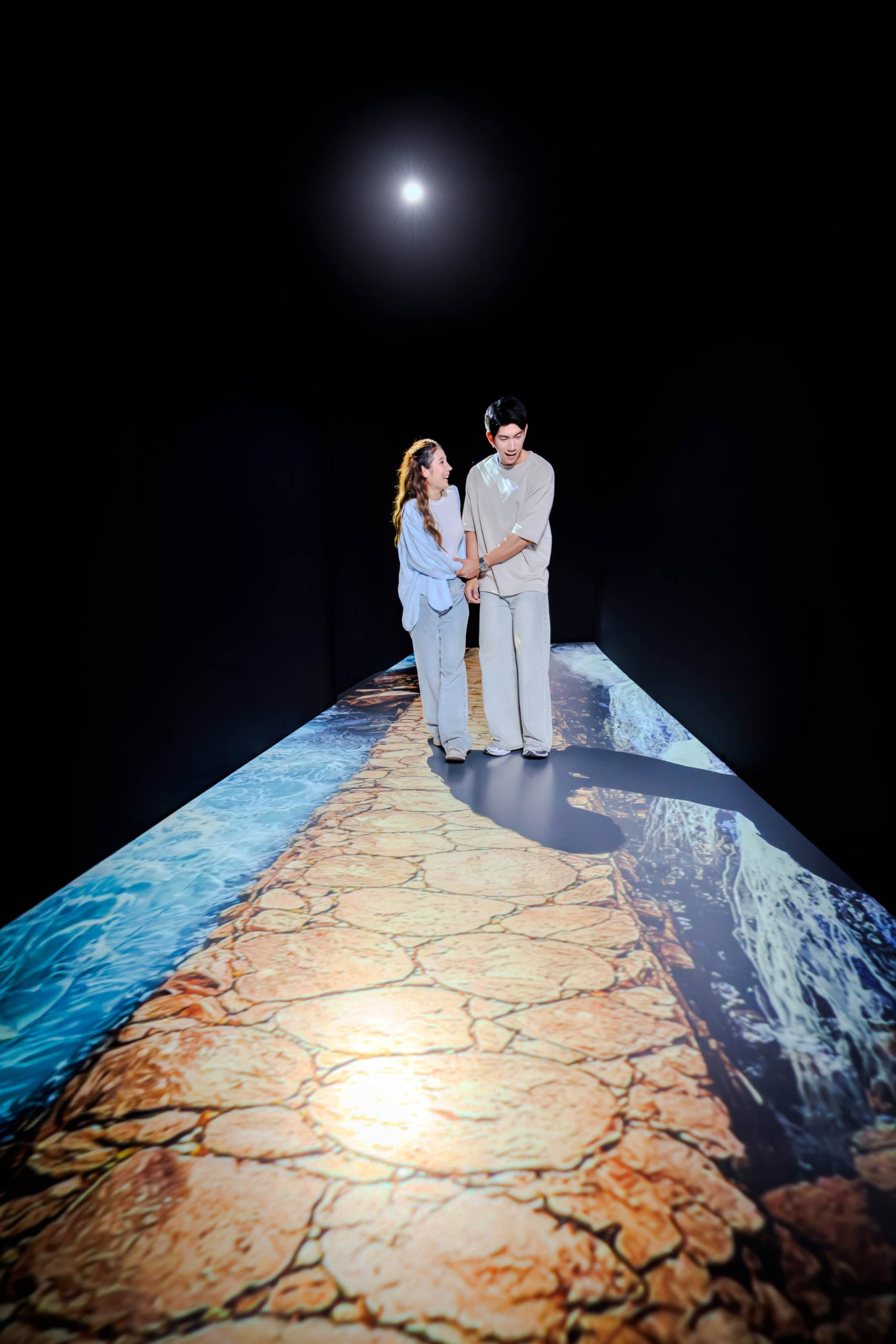 Couple Walking on Interactive Stone Path Projection